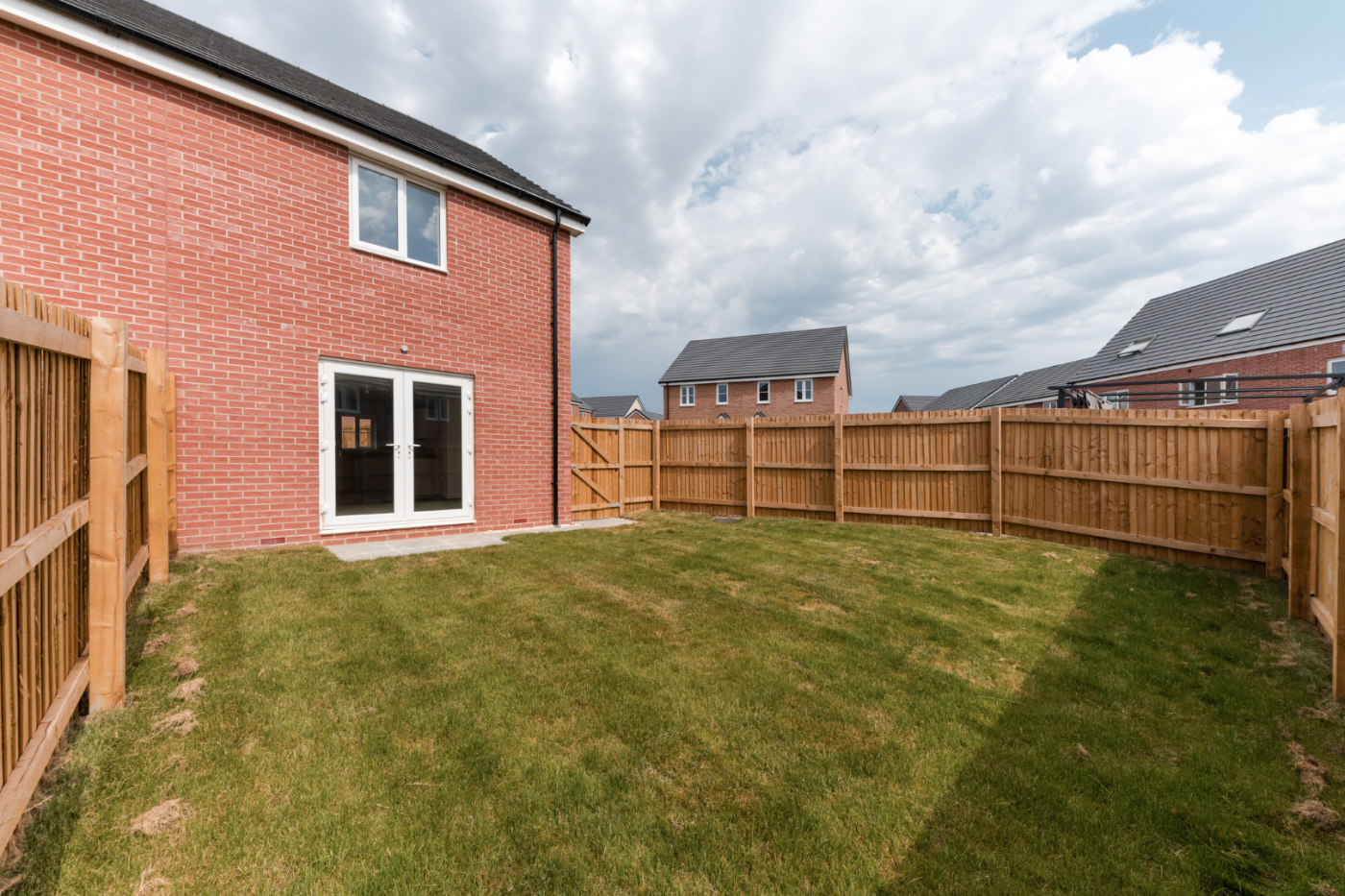 garden looking towards a patio and house