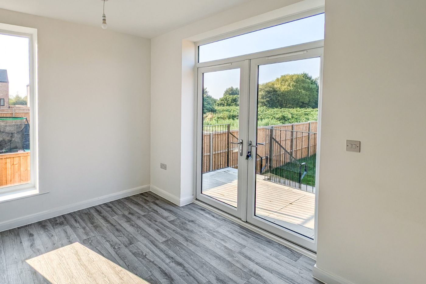 dining area with patio doors out into the garden