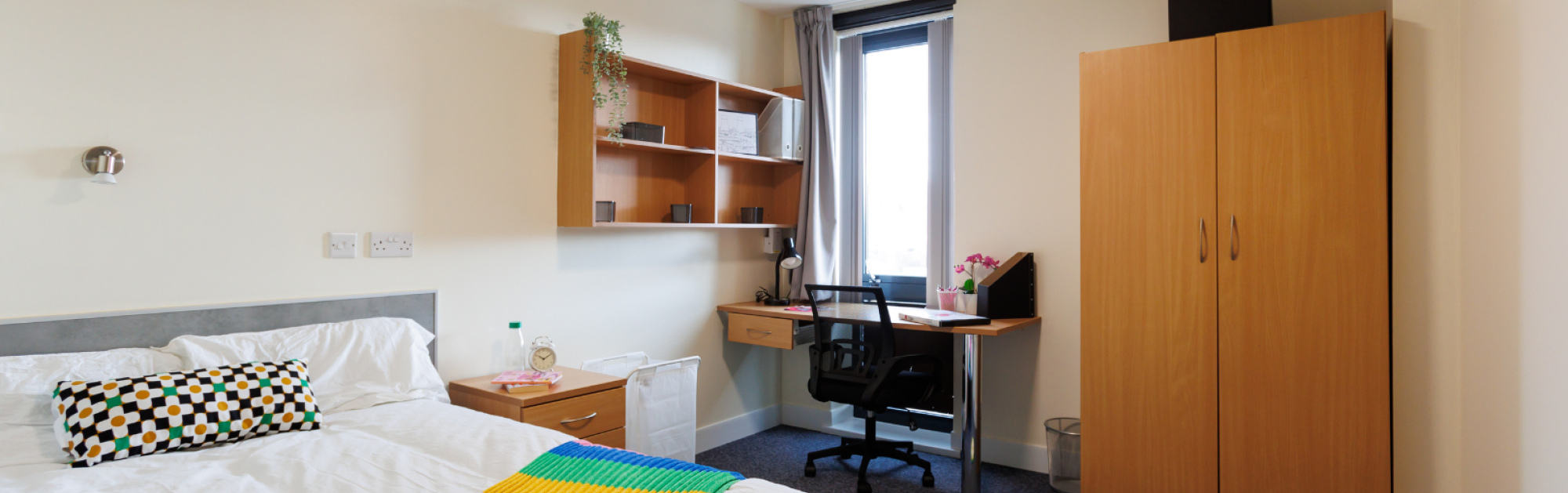 Bedroom with desk, 3/4 bed and wardrobe