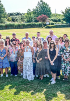 A group of people smiling at the camera