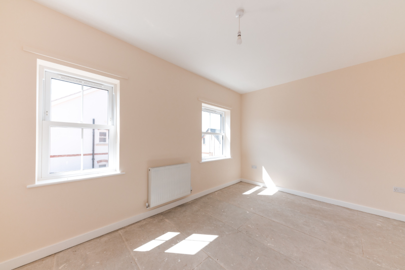 Bedroom with two windows