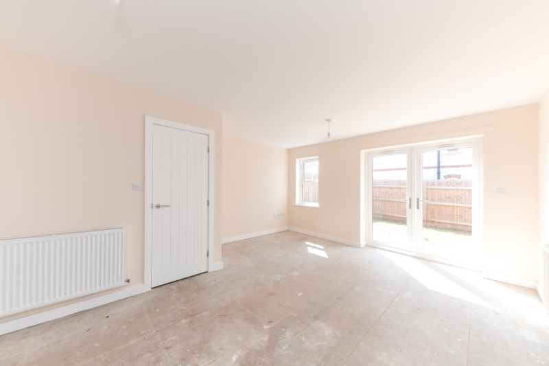 Living room with patio doors out to the garden