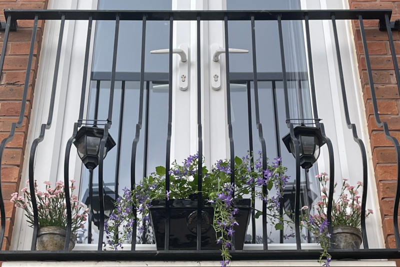 Juliette balcony with plants