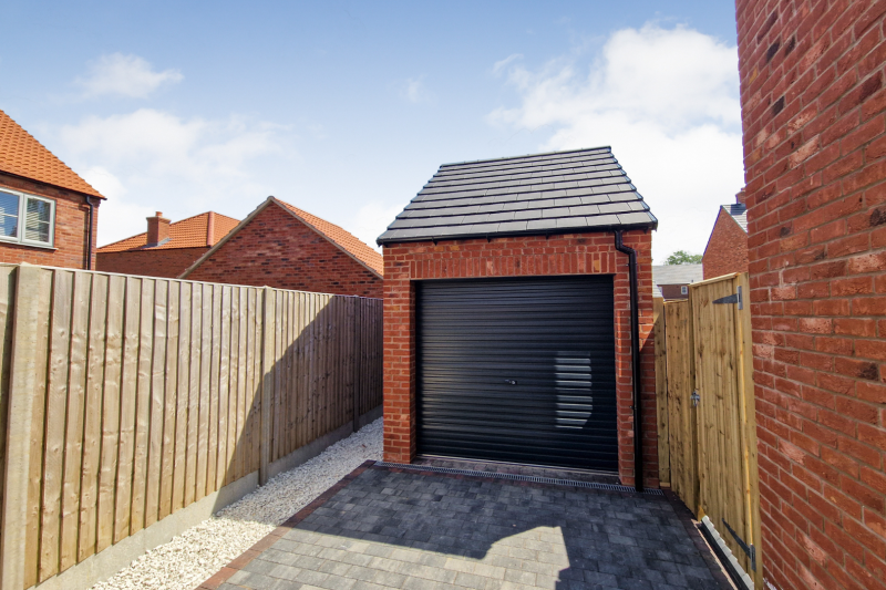 Front of garage and driveway