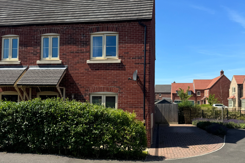 End terrace with a driveway space for two cars